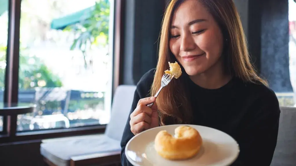 Participant tasting a pastry during a food study